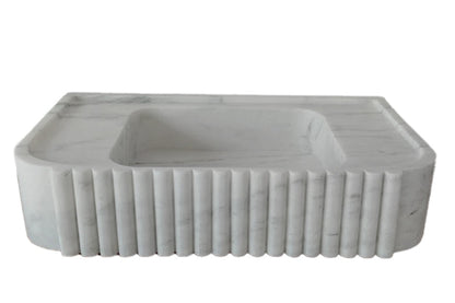 Elegant Carrara Marble vanity sink showcasing timeless luxury and sophisticated bathroom design.