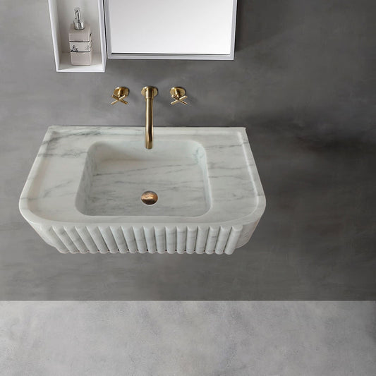 Elegant Carrara Marble vanity sink showcasing timeless luxury and sophisticated bathroom design.