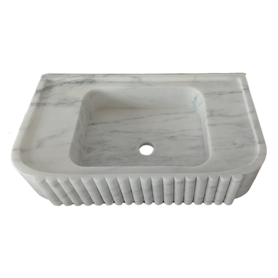 Elegant Carrara Marble vanity sink showcasing timeless luxury and sophisticated bathroom design.