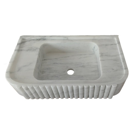 Elegant Carrara Marble vanity sink showcasing timeless luxury and sophisticated bathroom design.