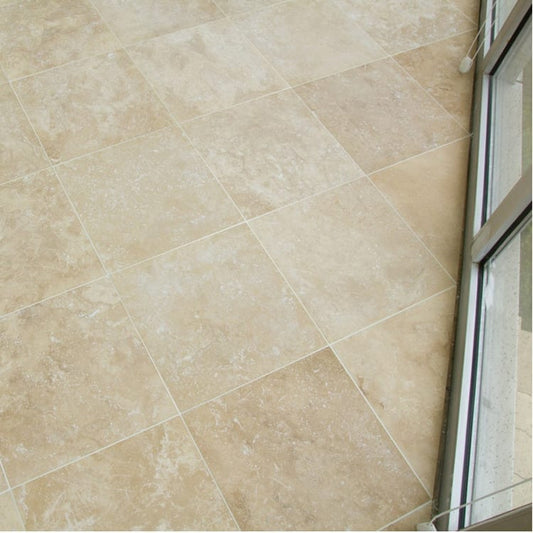 Denizli Beige travertine tile showcasing natural texture and elegant design for sophisticated interior spaces.