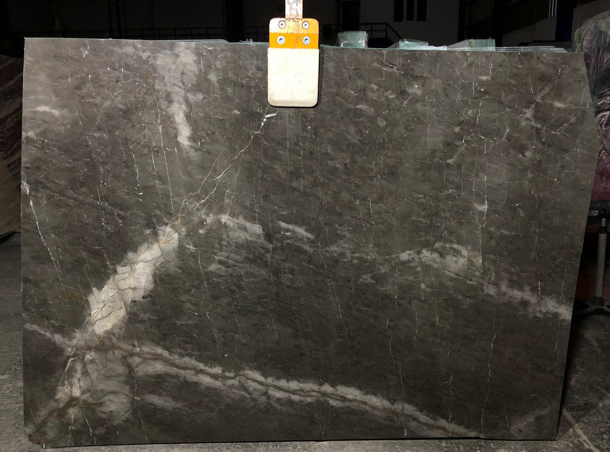 Emotion Gray marble slabs showcasing elegant natural stone patterns for sophisticated interior design projects.