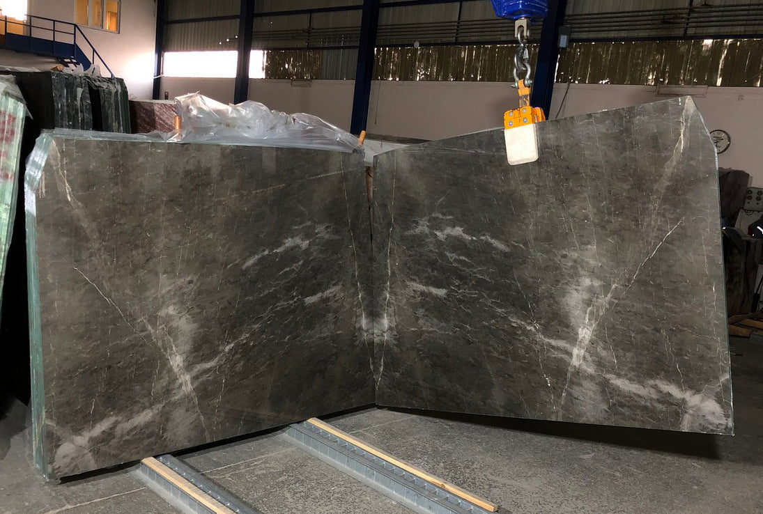 Emotion Gray marble slabs showcasing elegant natural stone patterns for sophisticated interior design projects.