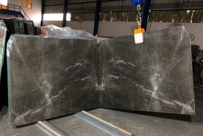 Emotion Gray marble slabs showcasing elegant natural stone patterns for sophisticated interior design projects.