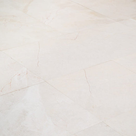 Elegant French Vanilla marble tiles with natural veining, perfect for sophisticated interior designs and durable flooring solutions.