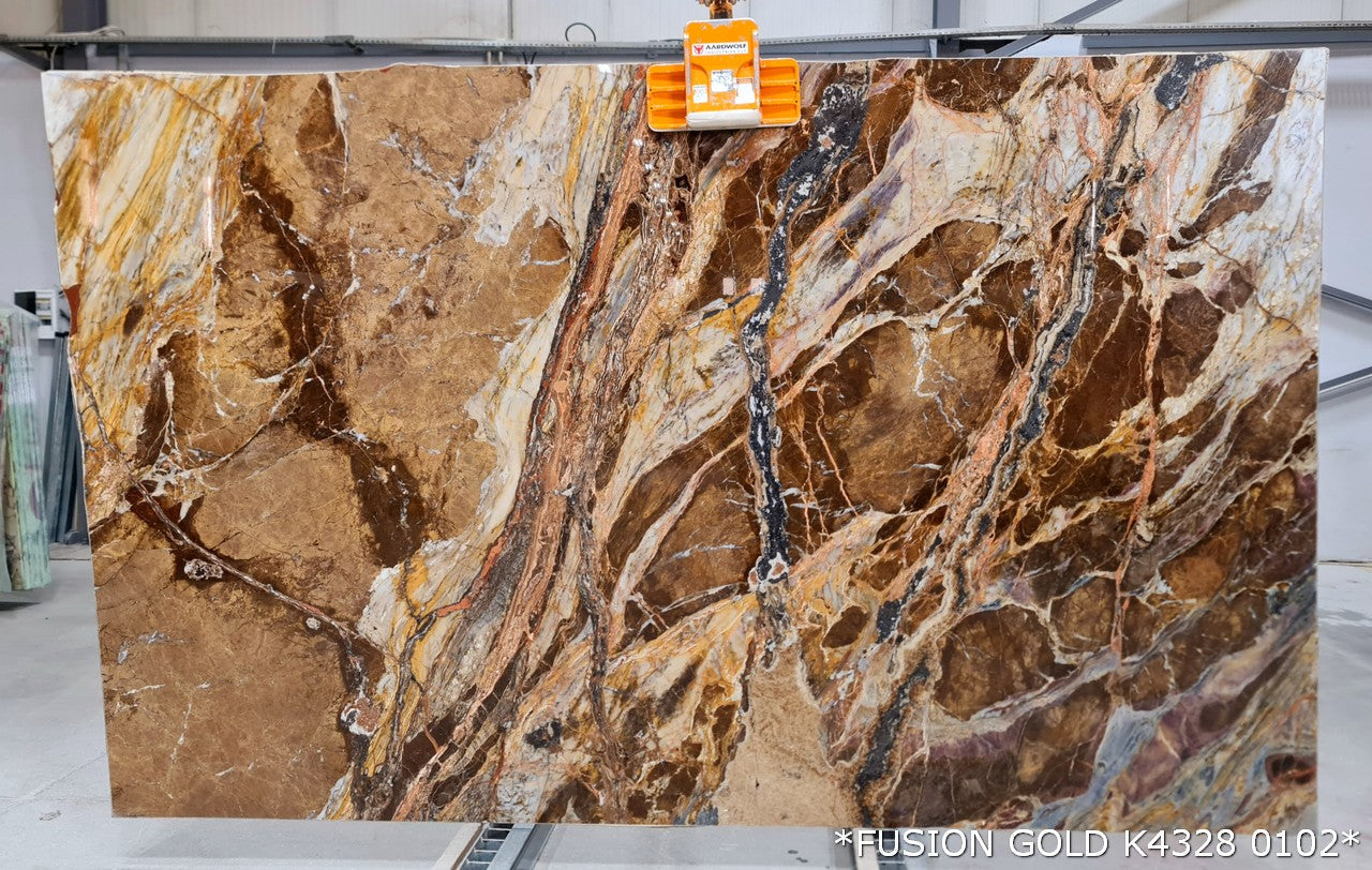 Premium Fusion Gold marble slabs showcasing exquisite design and durability for elegant interior solutions.