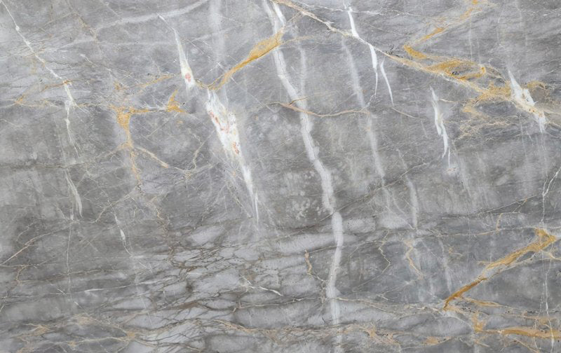 Gris Dorado marble slabs showcasing elegant texture and premium quality for sophisticated interior designs.