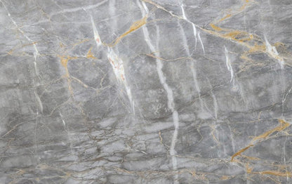 Gris Dorado marble slabs showcasing elegant texture and premium quality for sophisticated interior designs.