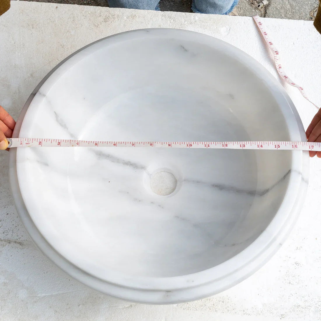 Elegant Carrara marble vanity sink showcasing timeless design and durable craftsmanship for luxury bathrooms.