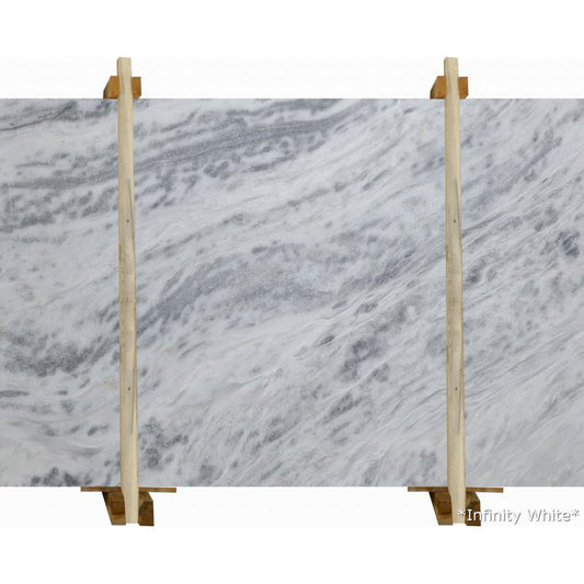 Infinity White marble slabs showcasing elegant, high-quality surfaces ideal for luxurious interior designs.