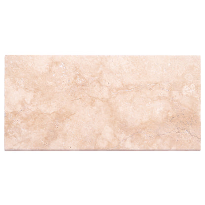 Elegant travertine pool tiles enhancing outdoor swimming area with durable and stylish natural stone