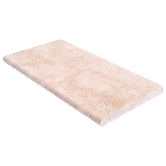 Elegant travertine pool tiles enhancing outdoor swimming area with durable and stylish natural stone