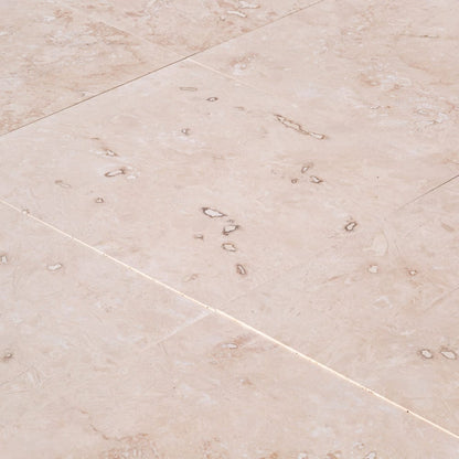 Elegant travertine flooring showcasing timeless beauty and luxurious stone craftsmanship for sophisticated interior design.