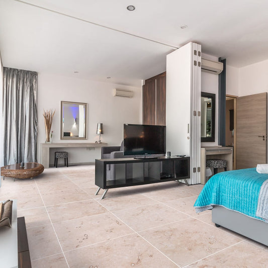 Elegant travertine flooring showcasing timeless beauty and luxurious stone craftsmanship for sophisticated interior design.