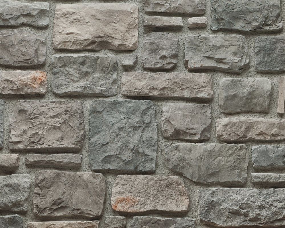 Elegant Ashlar Pattern stone wall constructed with high-quality manufactured stone, perfect for modern architectural designs.