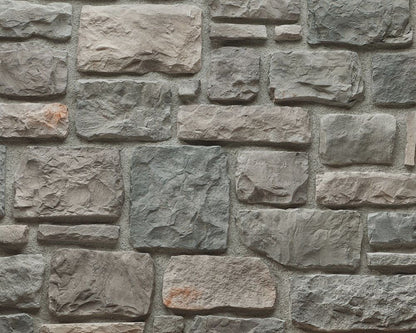 Elegant Ashlar Pattern stone wall constructed with high-quality manufactured stone, perfect for modern architectural designs.