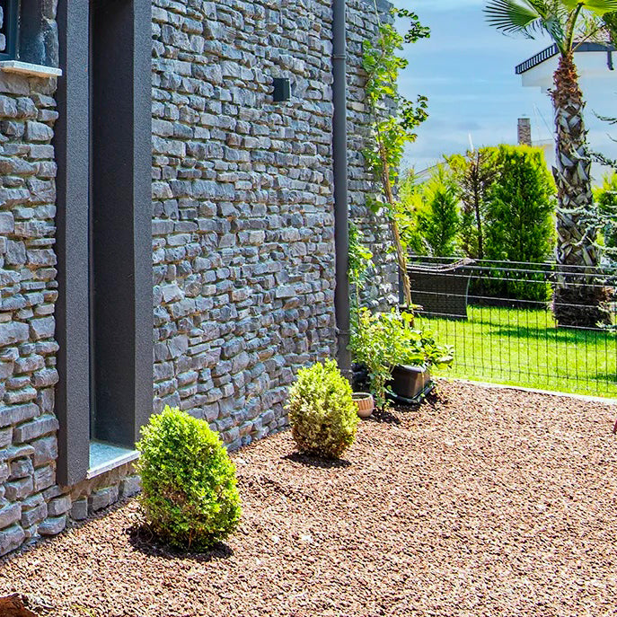 Anthracite and slate natural stone surfaces showcasing durable, elegant design for contemporary architecture.