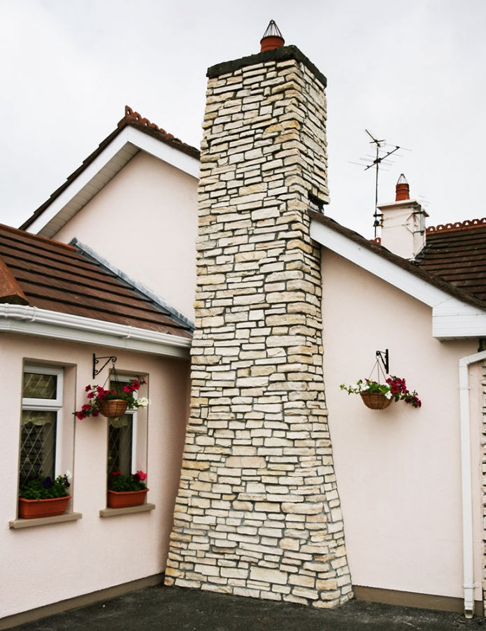 Sierra Pearl manufactured stone exterior wall showcasing natural texture and durability