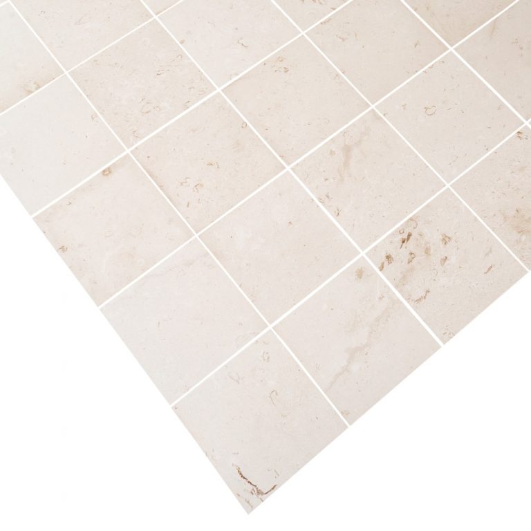 Close-up of durable white limestone surface showcasing natural texture and strength for construction use
