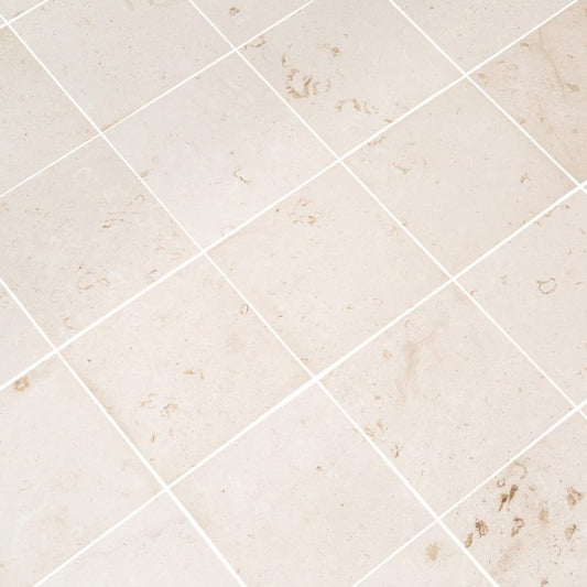 Close-up of durable white limestone surface showcasing natural texture and strength for construction use
