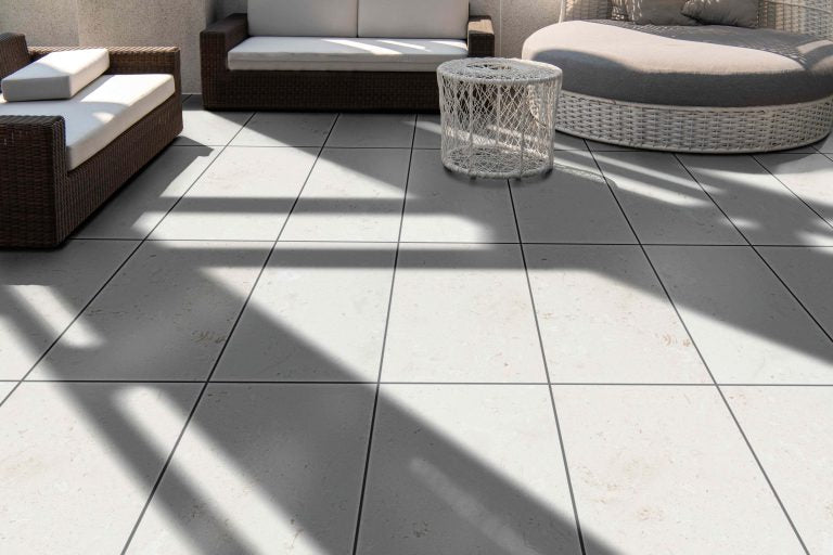 Close-up of durable white limestone surface showcasing natural texture and strength for construction use