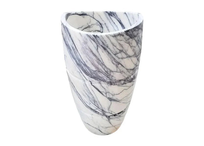 Elegant marble pedestal sink showcasing timeless design and superior craftsmanship for luxurious bathroom aesthetics
