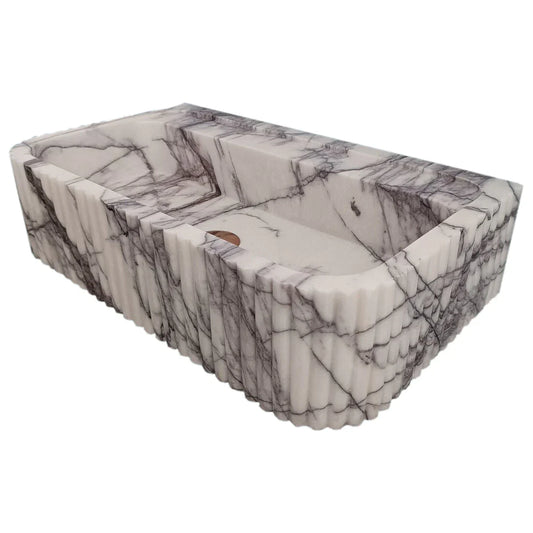 Elegant marble sink showcasing smooth texture and refined craftsmanship, perfect for modern bathroom design
