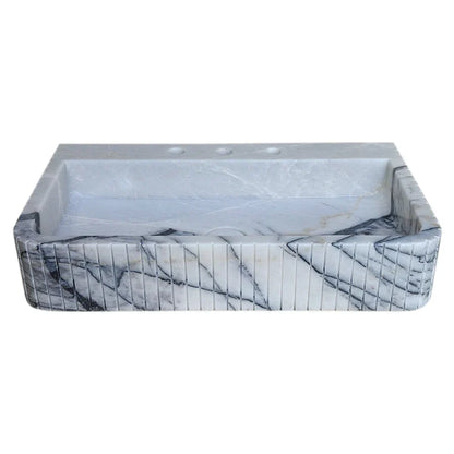 Elegant marble sink showcasing refined craftsmanship and luxurious bathroom design