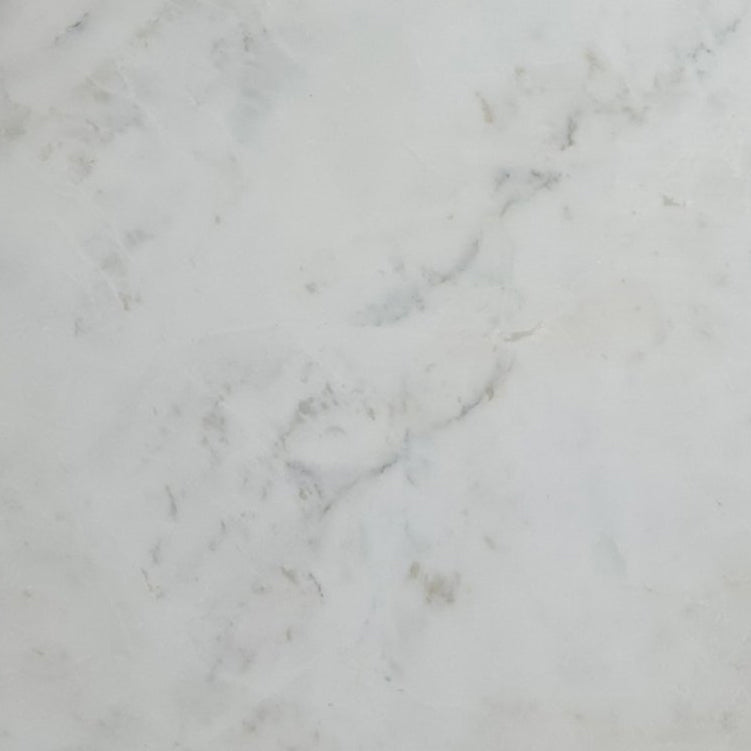 Oliva White Marble showcasing polished elegance in luxurious interior design settings