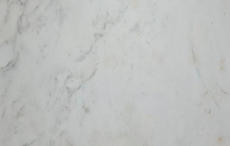 Oliva White Marble showcasing polished elegance in luxurious interior design settings