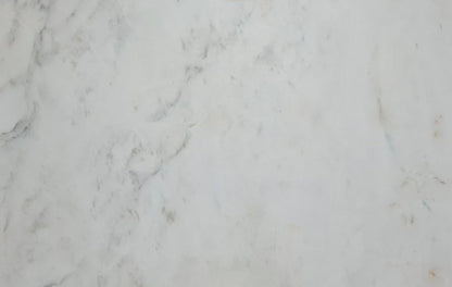 Oliva White Marble showcasing polished elegance in luxurious interior design settings
