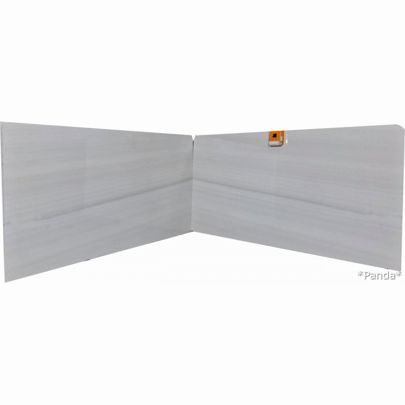Panda Classico white marble slab showcasing elegant natural patterns ideal for luxury interior design applications.