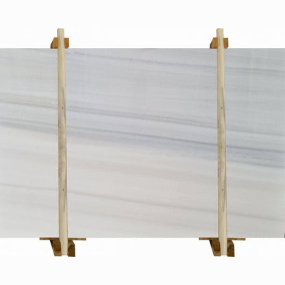 Panda Classico white marble slab showcasing elegant natural patterns ideal for luxury interior design applications.