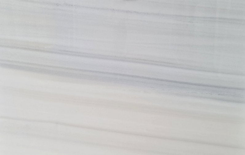 Panda Classico white marble slab showcasing elegant natural patterns ideal for luxury interior design applications.