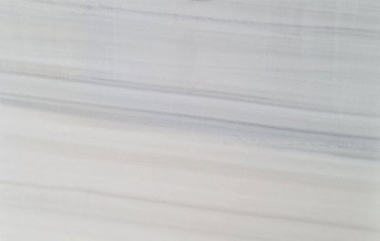 Panda Classico white marble slab showcasing elegant natural patterns ideal for luxury interior design applications.