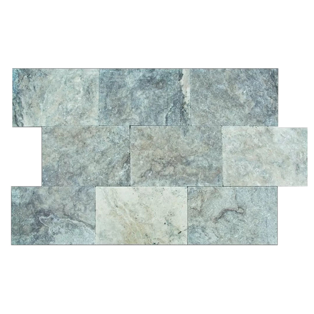 Elegant silver decor complimenting natural travertine stone for sophisticated interior design.