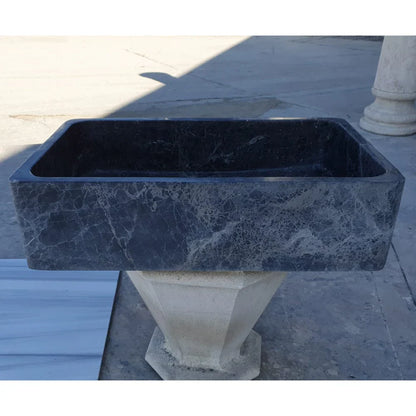 Elegant marble sink inspired by Sirius Black, combining luxury and dark aesthetic for a refined bathroom design.