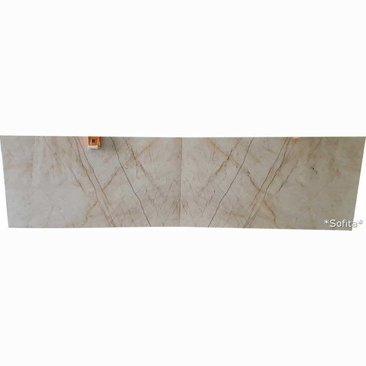 Elegant beige marble surface showcasing intricate natural patterns and smooth texture for refined interior design.