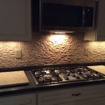 Natural Travertine stone in rich Noce Brown finish, ideal for elegant flooring and wall applications