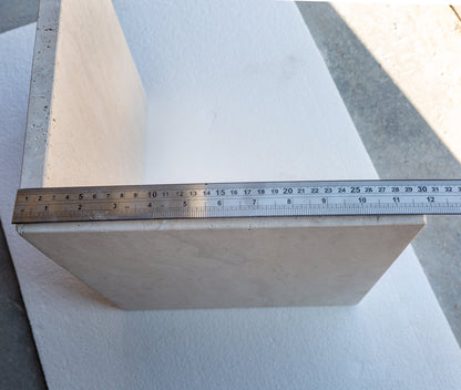Elegant travertine coffee table showcasing natural stone texture ideal for sophisticated living room decor