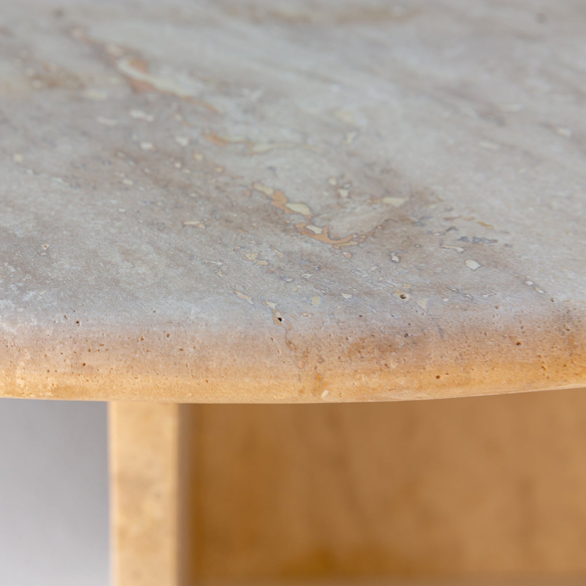 Elegant travertine coffee table showcasing natural stone texture ideal for sophisticated living room decor