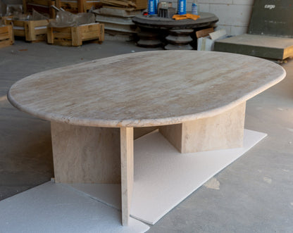Elegant travertine coffee table showcasing natural stone texture ideal for sophisticated living room decor