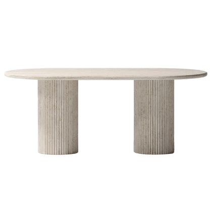 Elegant travertine dining table showcasing natural stone texture and sophisticated design for upscale interiors.