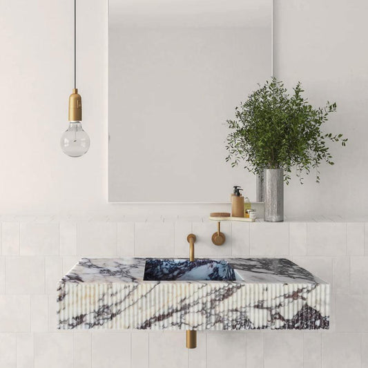Elegant Calacatta Viola marble vanity showcasing luxurious natural stone for sophisticated bathroom design.