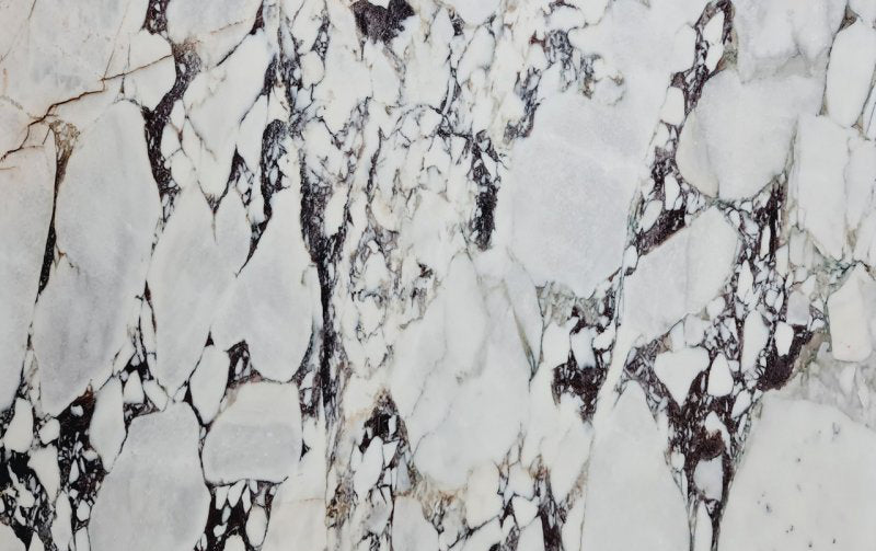 Calacatta Viola polished marble surface showcasing elegant natural veining and luxurious finish for premium interiors