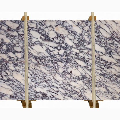 Calacatta Viola polished marble surface showcasing elegant natural veining and luxurious finish for premium interiors