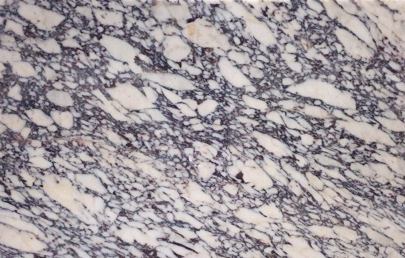 Calacatta Viola polished marble surface showcasing elegant natural veining and luxurious finish for premium interiors