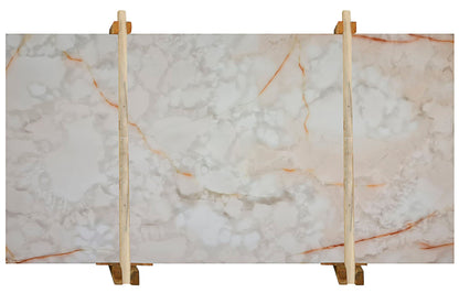 White Onyx bookmatching slabs showcasing luxurious natural stone patterns for elegant interior design
