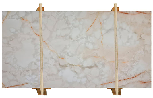 White Onyx bookmatching slabs showcasing luxurious natural stone patterns for elegant interior design